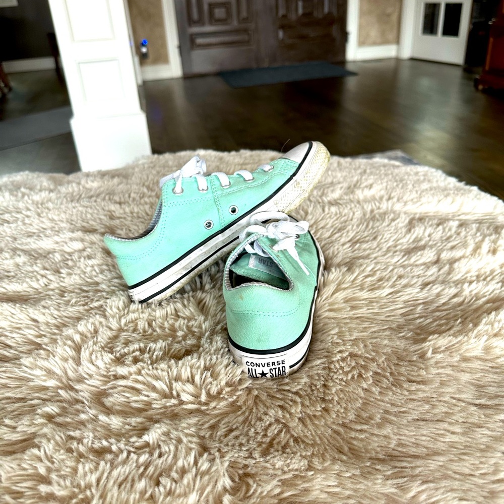 Children’s size 2 Converse All Star sneakers.
